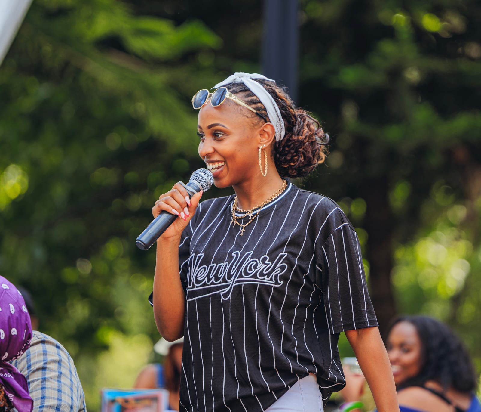 Joy Mido moderating and hosting, image 1